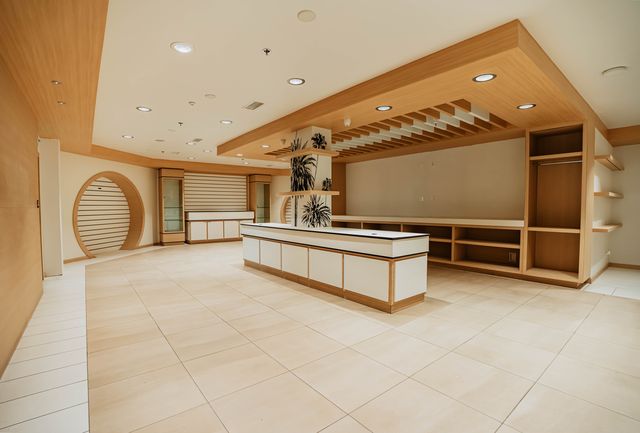 Showroom floor with center island and shelving units
